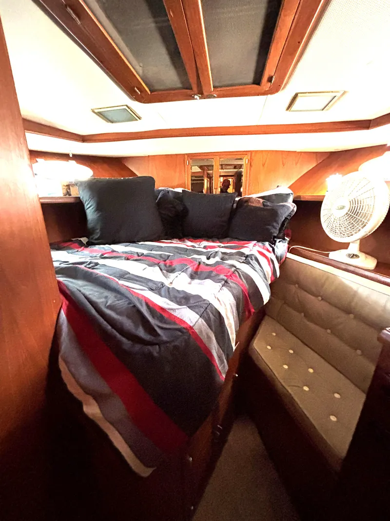 Slide: The Image of Cozy cabin interior of 1988 Marine Trader Tradewinds 43 Motor Yacht. - 45