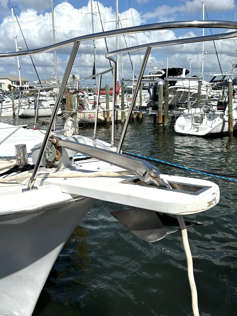 Slide: The Image of 1988 Marine Trader Tradewinds 43 Motor Yacht docked in marina. - 5