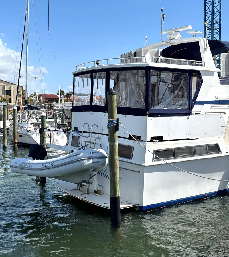 Slide: The Image of 1988 Marine Trader Tradewinds 43 Motor Yacht docked in marina. - 8