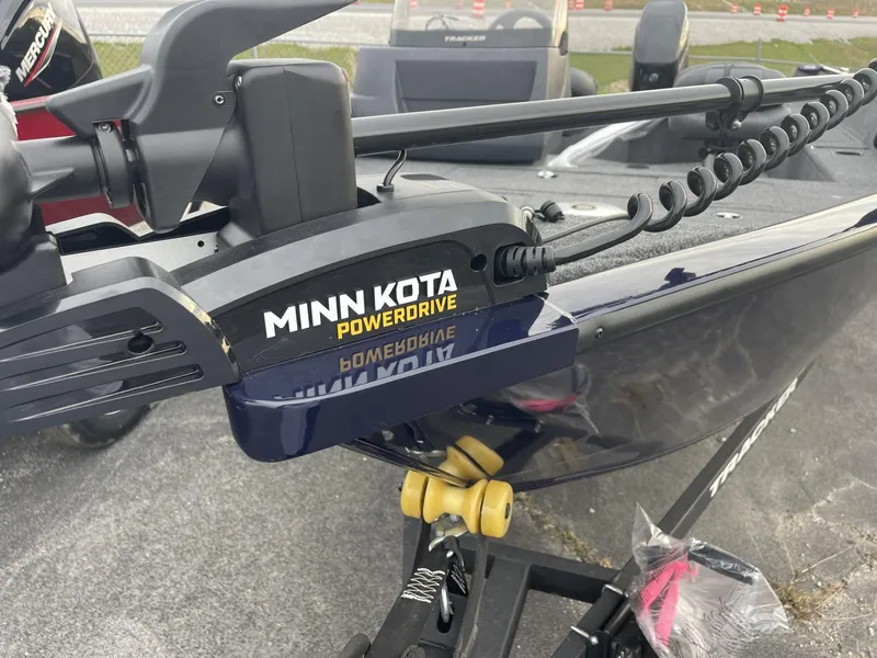 Slide: The Image of 2025 Tracker Pro Guide V-16 SC with Minn Kota PowerDrive trolling motor. - 9
