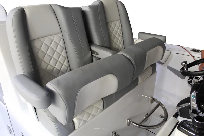 Slide: The Image of Luxury seating on 2025 Marlago 37 SS boat, featuring elegant gray upholstery. - 3