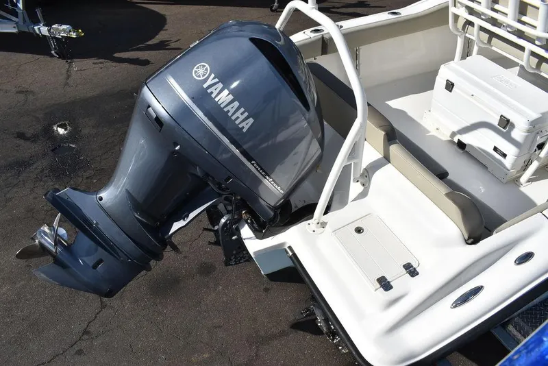 Slide: The Image of 2022 Key West 219fs boat with Yamaha outboard motor, rear view. - 10