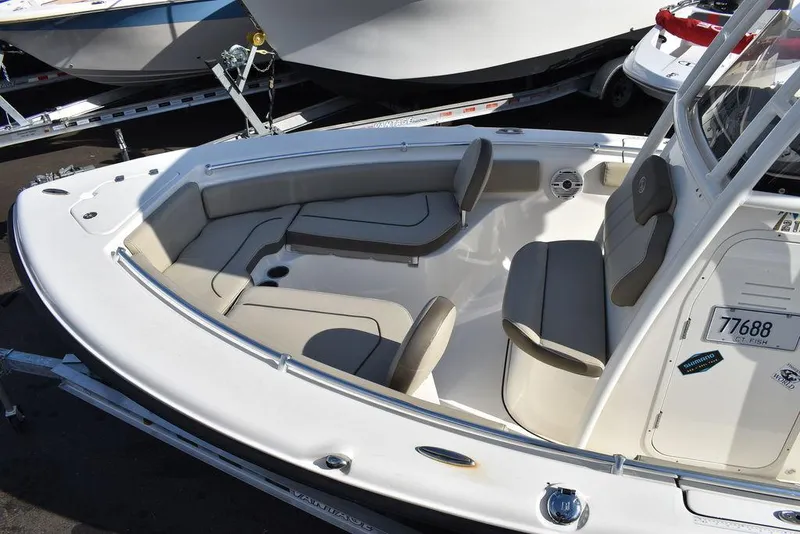 Slide: The Image of 2022 Key West 219fs boat with spacious seating and sleek design. - 22