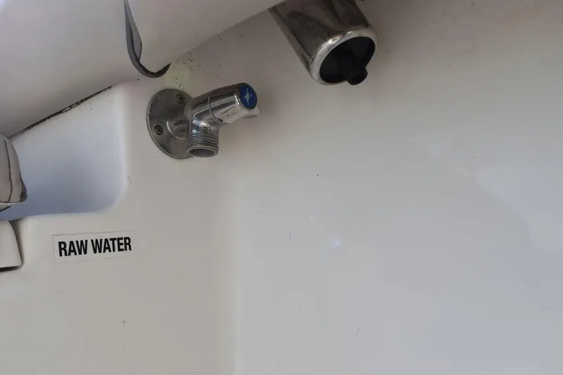 Slide: The Image of Key West 219fs 2022 boat raw water outlet detail. - 30