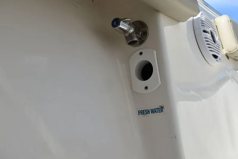 Slide: The Image of 2022 Key West 219fs boat fresh water outlet detail. - 31