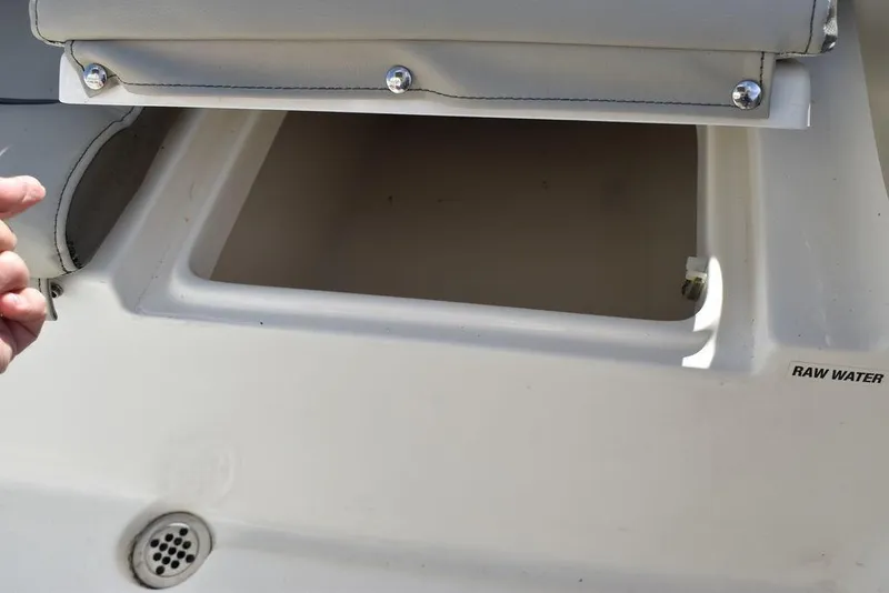 Slide: The Image of Open storage compartment on 2022 Key West 219fs boat. - 32