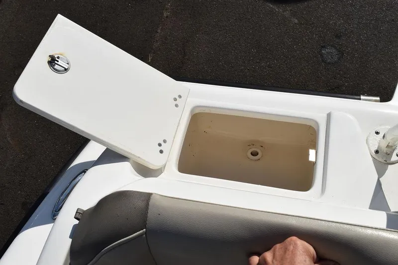 Slide: The Image of Open storage compartment on 2022 Key West 219fs boat. - 33