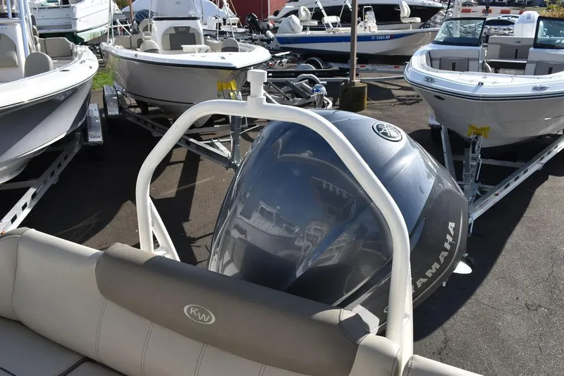 Slide: The Image of 2022 Key West 219fs boat with Yamaha engine in a showroom. - 34
