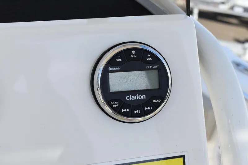 Slide: The Image of Clarion audio system on 2022 Key West 219fs boat dashboard. - 39