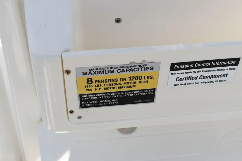 Slide: The Image of Key West 219fs 2022 boat capacity label: 8 persons or 1200 lbs, 250 HP motor. - 44