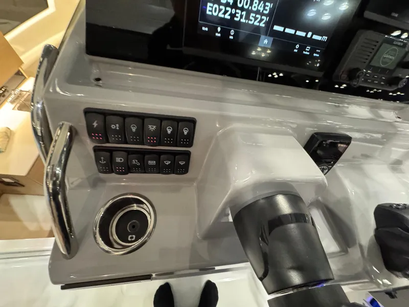 Slide: The Image of Control panel of 2025 Jeanneau Leader 9.0 WA Series 2 boat, featuring modern navigation instruments. - 10