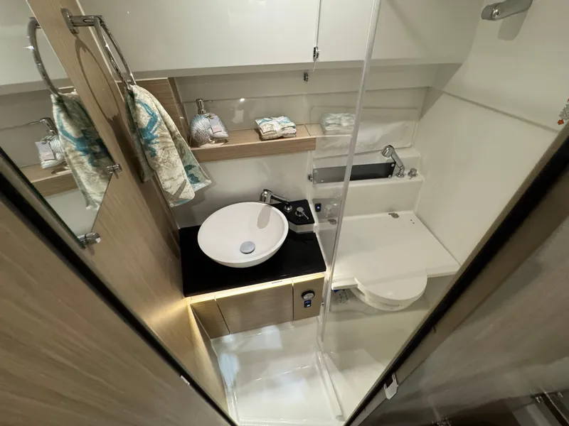Slide: The Image of 2025 Jeanneau Leader 9.0 WA Series 2 bathroom with modern sink and toilet. - 15