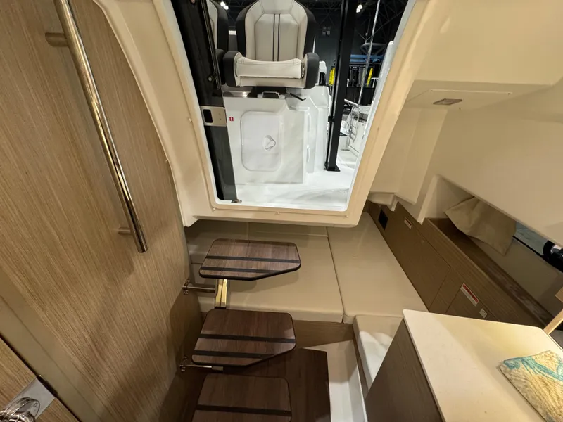 Slide: The Image of Interior view of 2025 Jeanneau Leader 9.0 WA Series 2 boat cabin. - 16