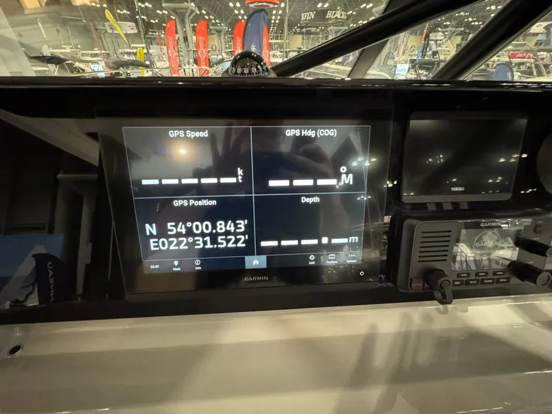 Slide: The Image of 2025 Jeanneau Leader 9.0 WA Series 2 dashboard with GPS display and navigation controls. - 8
