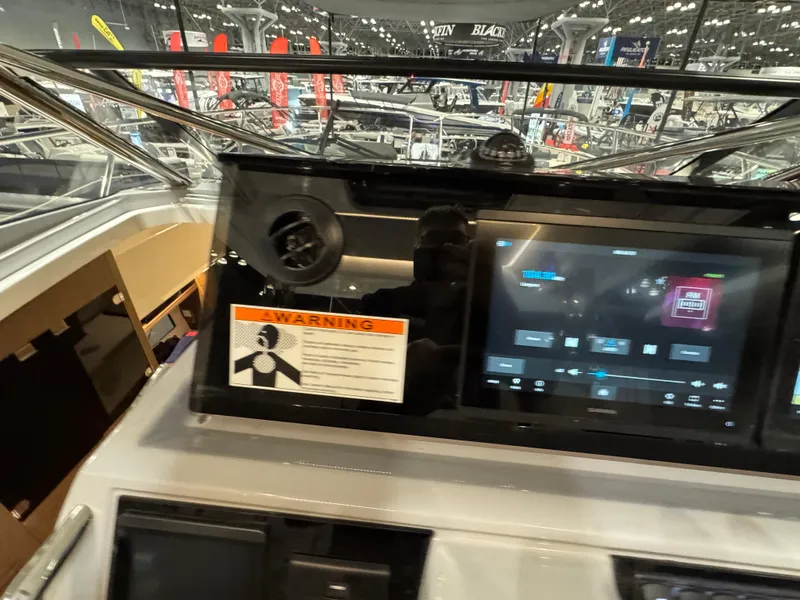 Slide: The Image of Control panel of 2025 Jeanneau Leader 10.5 WA Series 2 boat, featuring modern navigation display. - 15