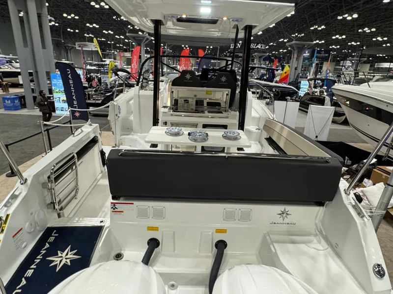 Slide: The Image of 2025 Jeanneau Leader 10.5 WA Series 2 boat interior at a boat show. - 2