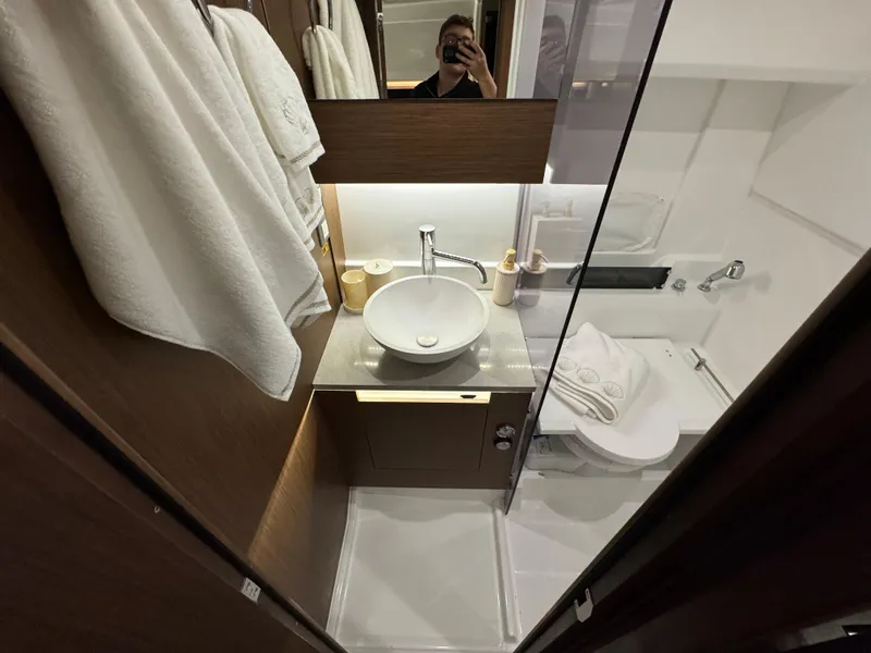 Slide: The Image of 2025 Jeanneau Leader 10.5 WA Series 2 bathroom with modern sink and towels. - 22
