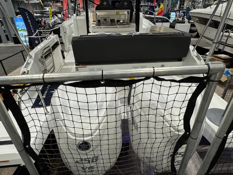 Slide: The Image of 2025 Jeanneau Leader 10.5 WA Series 2 boat displayed at a marine exhibition. - 3