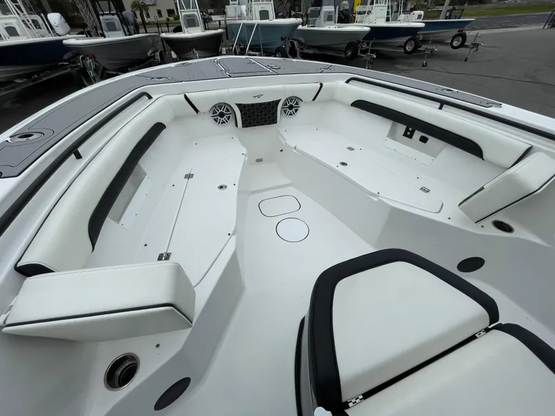 Slide: The Image of 2021 Tidewater 272 CC Adventure boat interior with spacious seating and modern design. - 3