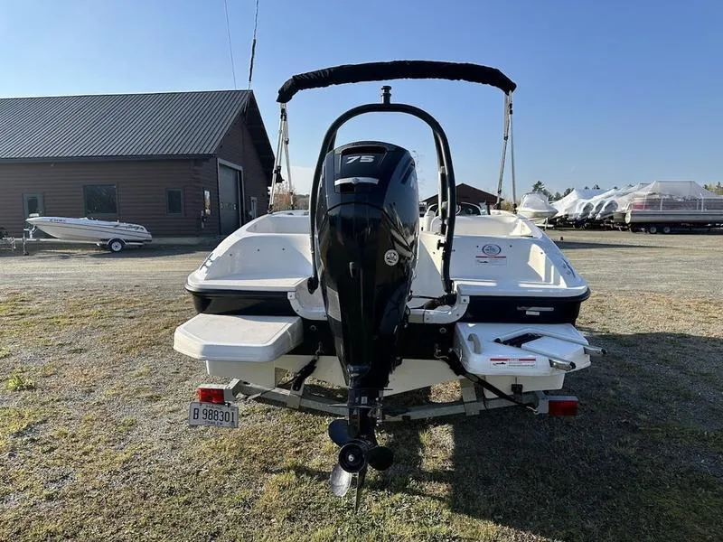 Slide: The Image of 2019 Bayliner E16 boat with 75 HP engine, parked outdoors. - 5