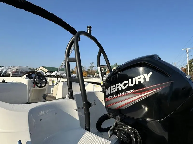 Slide: The Image of 2019 Bayliner E16 boat with Mercury FourStroke engine, clear sky background. - 7