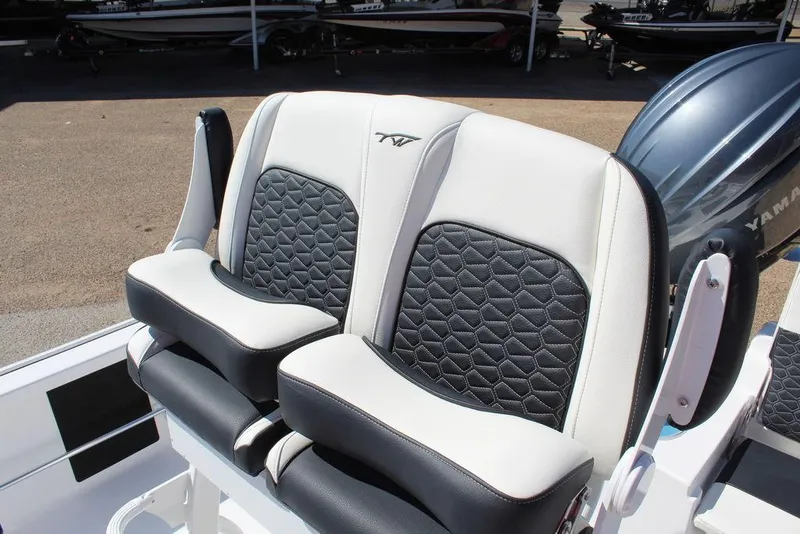 Slide: The Image of 2025 Tidewater 2110 Bay Max boat seats with stylish black and white upholstery. - 14