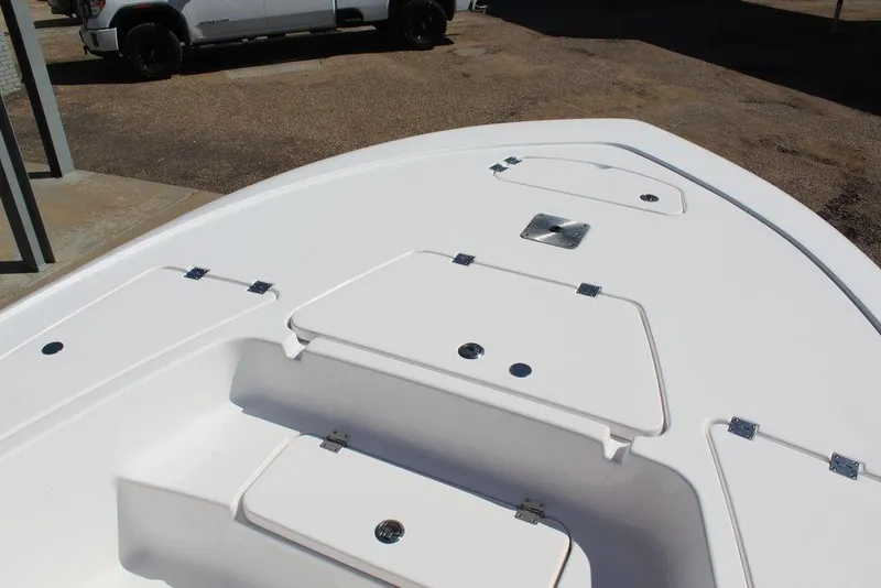 Slide: The Image of 2025 Tidewater 2110 Bay Max boat deck with storage compartments. - 20
