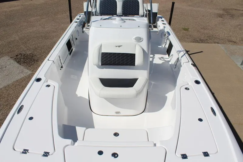 Slide: The Image of 2025 Tidewater 2110 Bay Max boat interior with seating and storage compartments. - 21