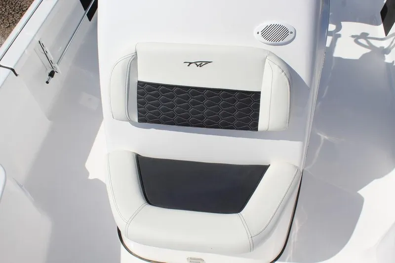 Slide: The Image of 2025 Tidewater 2110 Bay Max boat seat with stylish black and white design. - 24