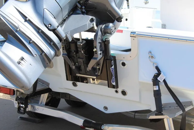Slide: The Image of 2025 Tidewater 2110 Bay Max boat engine and transom detail. - 5