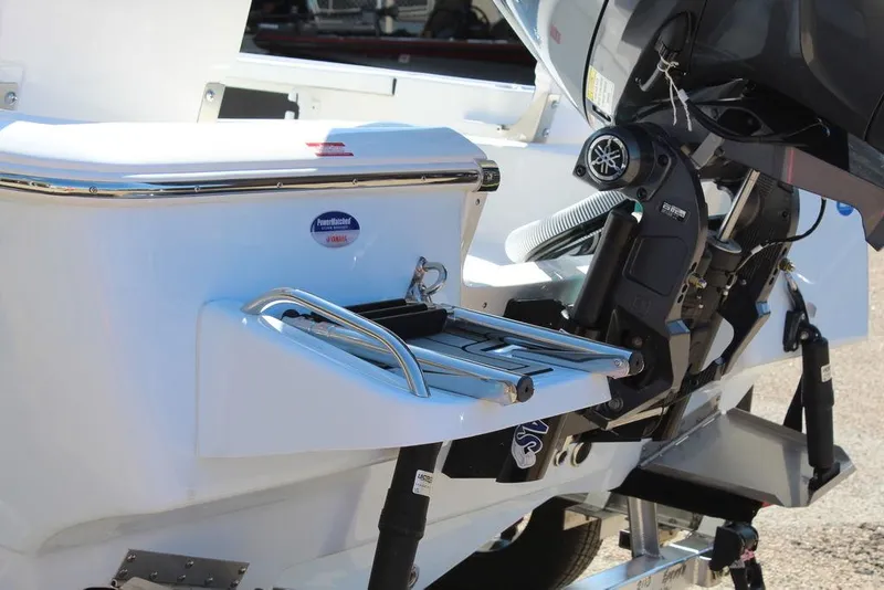 Slide: The Image of 2025 Tidewater 2110 Bay Max boat with motor and swim platform. - 7