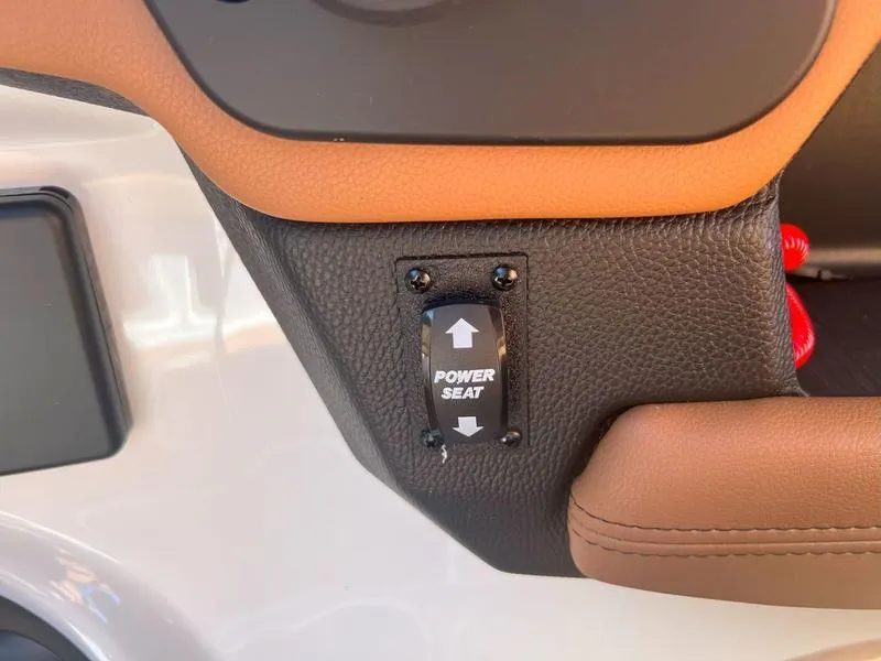 Slide: The Image of Power seat control in 2025 Malibu 23 LSV boat interior. - 13