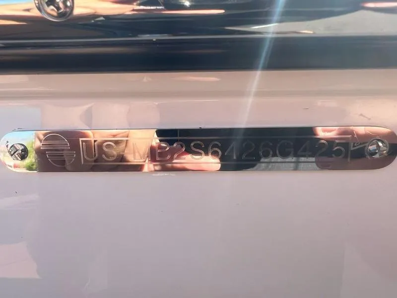 Slide: The Image of 2025 Malibu 23 LSV boat identification plate with serial number. - 37