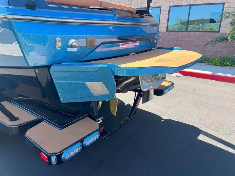 Slide: The Image of 2025 Axis A225 boat rear view with swim platform and propeller. - 10