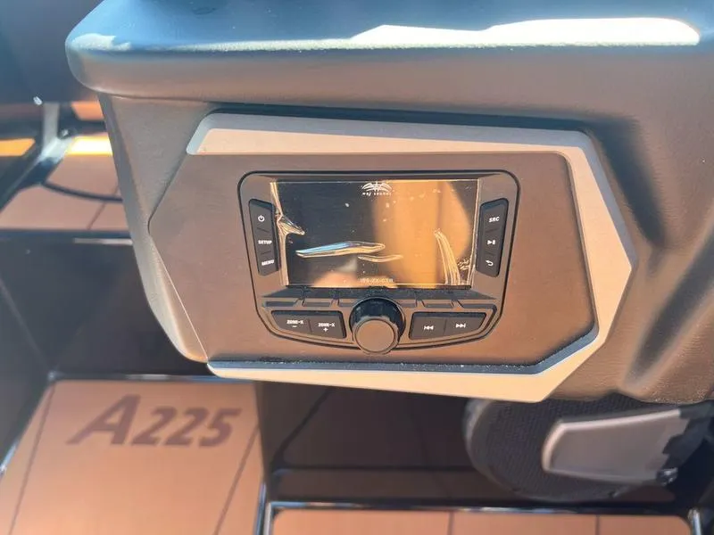 Slide: The Image of 2025 Axis A225 dashboard with control panel and A225 branding. - 13