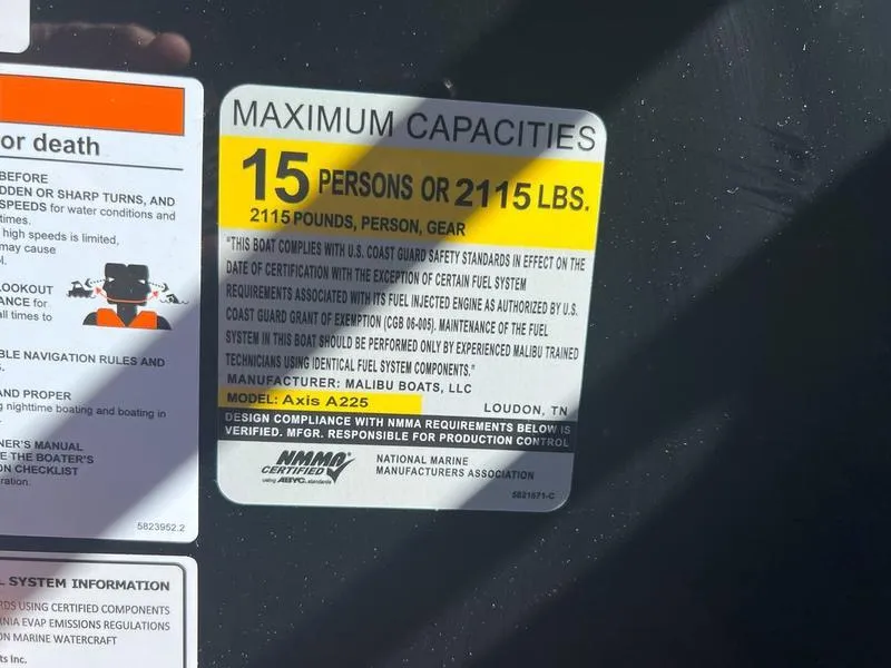 Slide: The Image of Capacity label for Axis A225 boat, 2025 model, max 15 persons or 2115 lbs. - 18