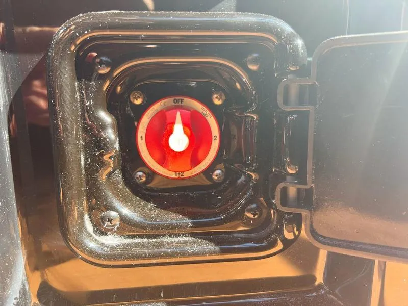 Slide: The Image of Red dial switch in Axis A225, 2025 model, set to "Off" position. - 21