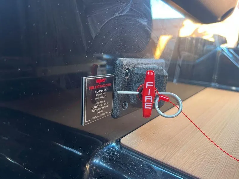 Slide: The Image of Fire extinguisher pull handle in Axis A225, 2025 model. - 26