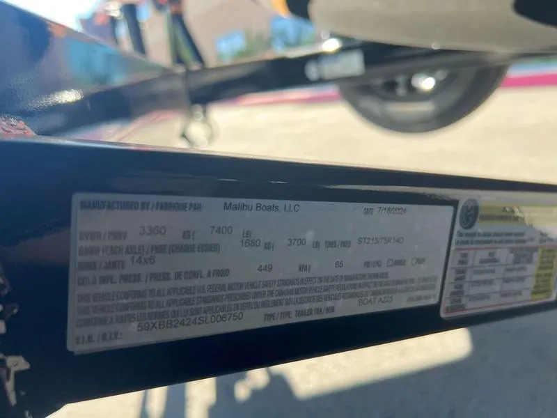 Slide: The Image of Close-up of a 2025 Axis A225 boat trailer label with specifications. - 31