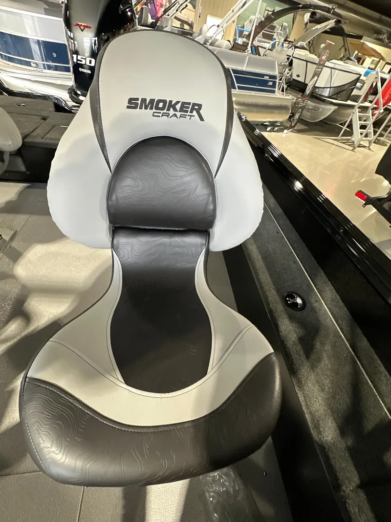 Slide: The Image of 2025 Smoker Craft Adventurer 188 DC boat seat, black and white design. - 13