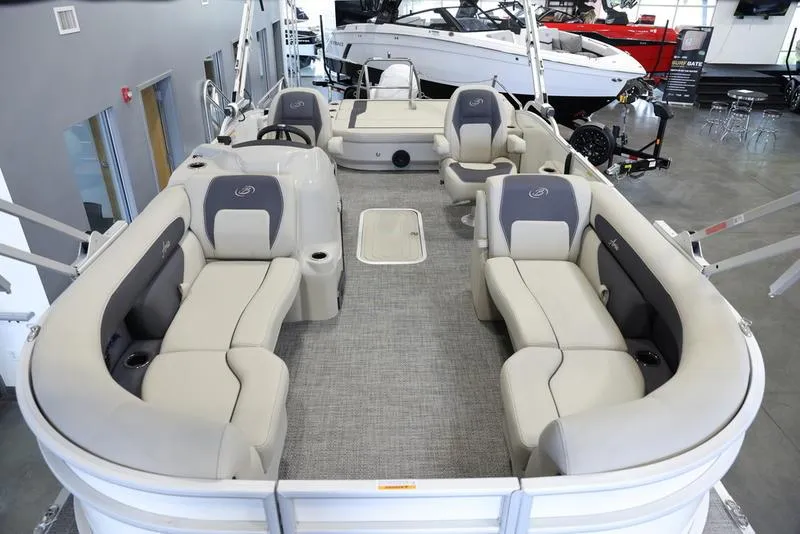 Slide: The Image of 2024 Barletta ARIA A22UC pontoon boat with spacious seating and modern interior design. - 2