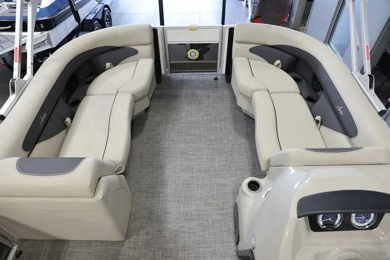Slide: The Image of 2024 Barletta ARIA A22UC boat interior with beige seating and modern design. - 3