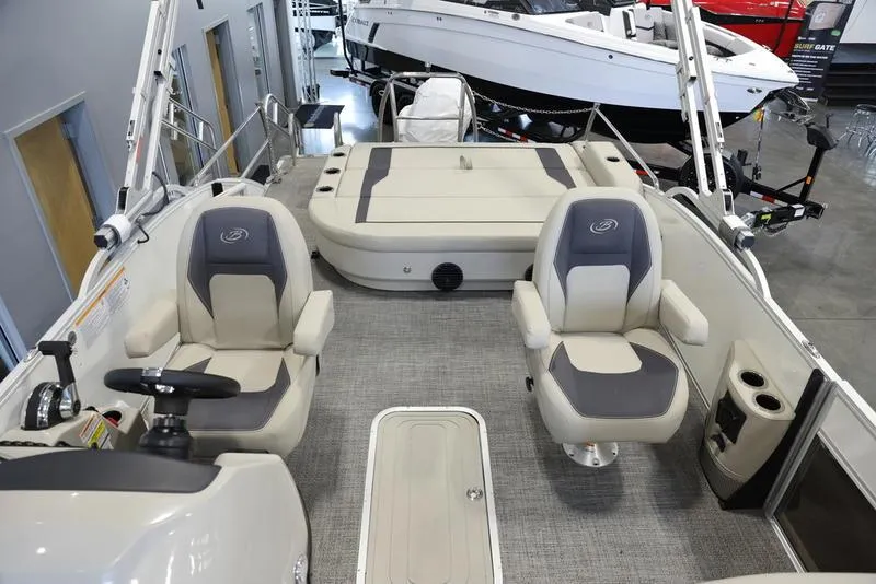 Slide: The Image of 2024 Barletta ARIA A22UC boat interior with plush seating and modern design. - 4