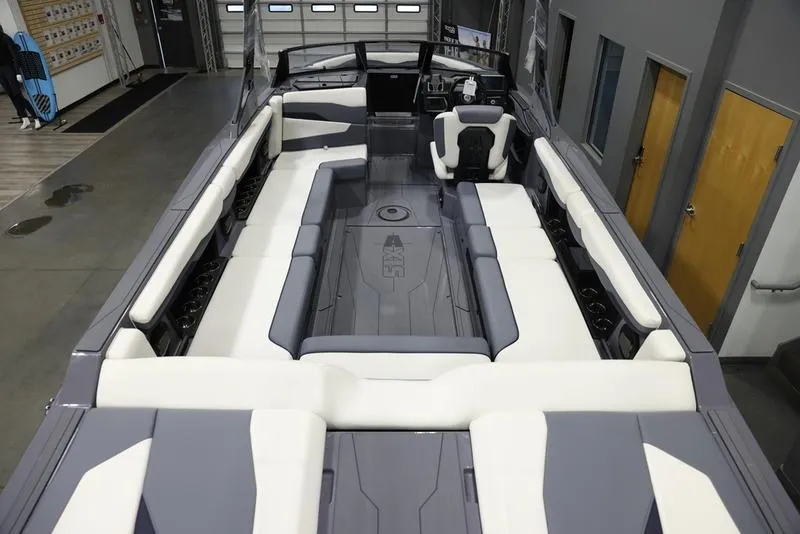 Slide: The Image of 2024 Axis T250 boat interior with spacious seating and modern design. - 11