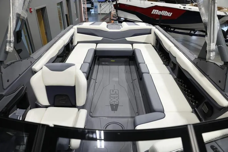 Slide: The Image of 2024 Axis T250 boat interior with spacious seating and modern design. - 15