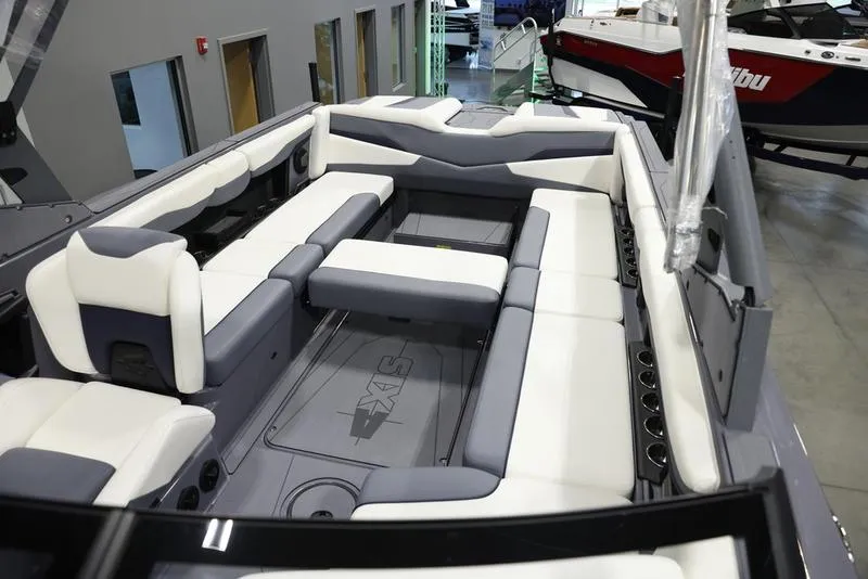 Slide: The Image of 2024 Axis T250 boat interior with spacious seating and modern design. - 16