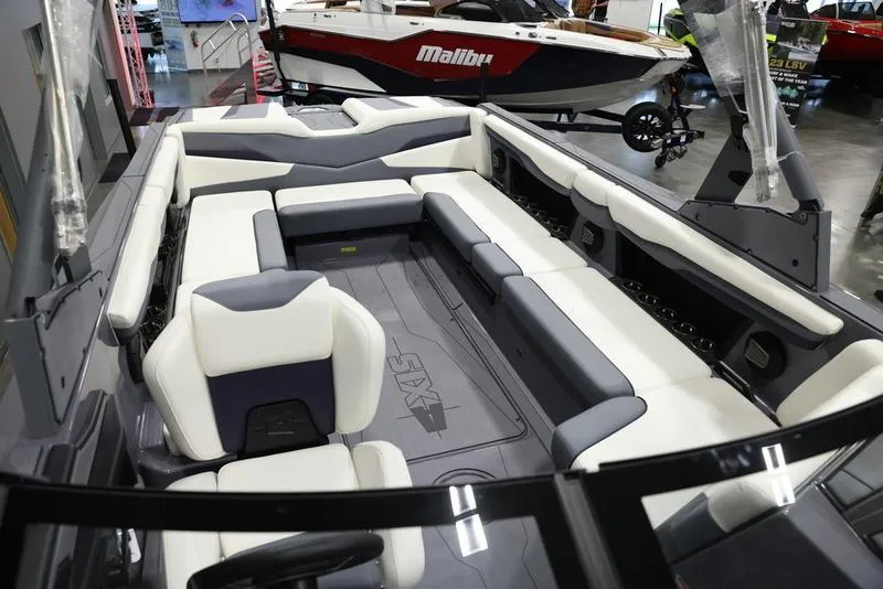 Slide: The Image of 2024 Axis T250 boat interior with spacious seating and modern design. - 17