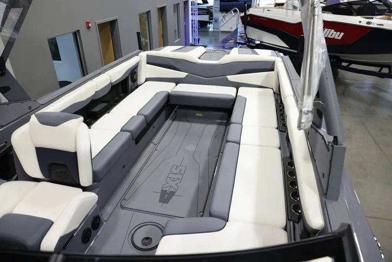 Slide: The Image of 2024 Axis T250 boat interior with spacious seating and modern design. - 18