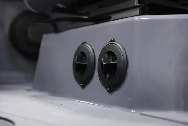 Slide: The Image of 2024 Axis T250 boat interior with dual black air vents. - 19