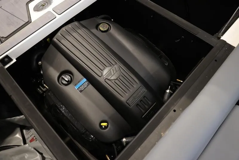 Slide: The Image of 2024 Axis A225 engine compartment showcasing a powerful, modern engine design. - 13